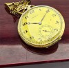 Używany, złoty (14k) zegarek kieszonkowy DOXA pięknie zdobiony z dewizką