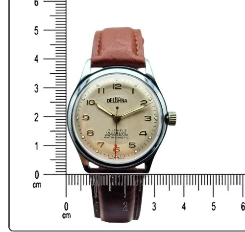 Zegarek mechaniczny Delbana z lat 50. na brązowym pasku
